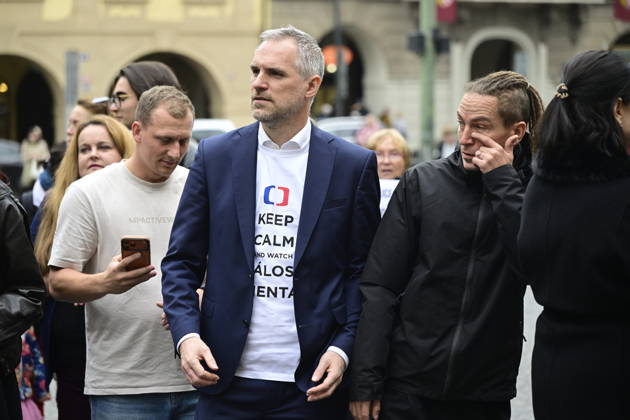 Pirates MPs Zdenek Hrib, middle, and Ivan Bartos, right, demonstrate against the governing coalition s plan to abolish license fees for Czech Television (CT) and Czech Radio (CRo), on the Lesser Town Square, in Prague, Czech Republic, on October 23, 2026. The hastily organized protest was a response to the fact that coalition lawmakers today pushed through a motion in the Chamber of Deputies to give priority to the first reading of this bill. (CTKxPhoto RomanxVondrous) CTKPhotoP2026102304872  CTKPhotoP2026102304872