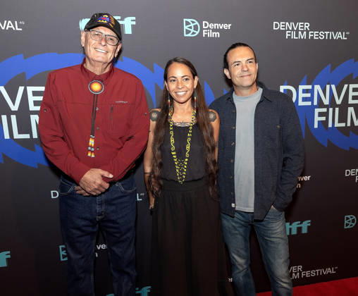 October 23, 2026, Denver, Colorado, USA: Producer RICK WILLIAMS, Director DEWI SUNGAI MARQUIS-HOUSTON, and Cinematographer JASON HOUSTON of the film People of the Sacred Land pose for a group photo during the 49th. Denver Film Festival Red Carpet event at the Ellie Caulkins Opera House Thursday night. Credit Image: ZUMA Press Wire) Denver USA  - ZUMAav4_ 20261023_zaf_av4_013 Copyright: xHectorxAcevedox