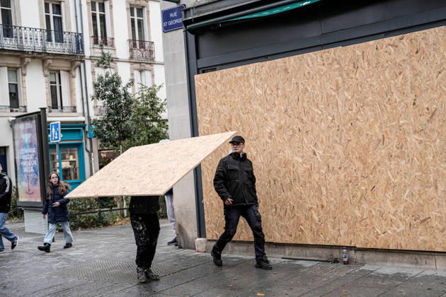 Shopfronts boarded up in Nancy ahead of planned protests NANCY, FRANCE - OCTOBER 23: Workers install protective wooden boards and plywood panels over shopfronts and commercial venues across downtown Nancy, France, on October 23, 2026. Local business owners and municipal authorities reinforced physical security measures ahead of large-scale public demonstrations planned for October 24, seeking to prevent vandalism and structural damage along major commercial corridors. Muhammed Said Tako Anadolu Nancy France. Editorial use only. Please get in touch for any other usage.  Copyright: x2026xAnadoluxMuhammedxSaidxTakox