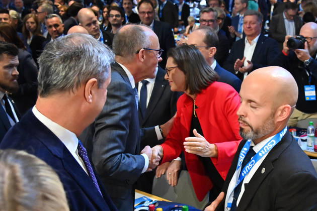 Bundeskanzler Friedrich MERZ begruesst Ilse AIGNER (Landtagspraesidentin Bayern). CSU Parteitag 2026 am 23.und 24.10..2026 MESSE MUENCHEN