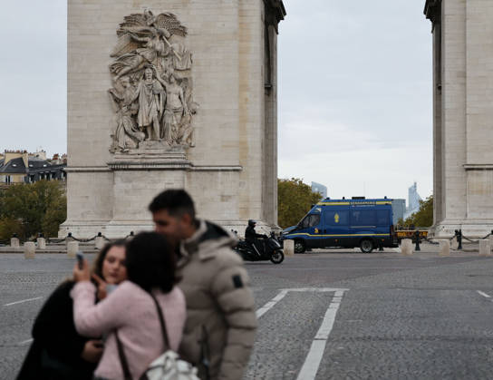 (261024) -- PARIS, Oct. 24, 2026 -- A security vehicle is seen near the Arc de Triomphe in Paris, France, Oct. 24, 2026. French Interior Minister Laurent Nunez said Tuesday that the government would deploy soldiers from the French army s Operation Sentinelle to help prevent violence during the demonstrations announced for Oct. 24. ) FRANCE-PARIS-PROTEST-SECURITY WuxHuiwo 