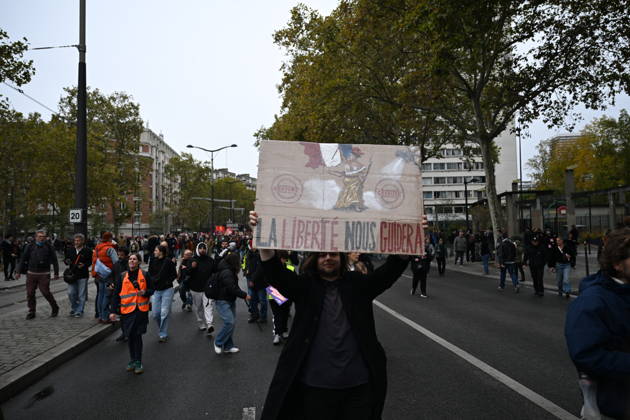 Demonstrators gather near Porte d Italie amid ongoing protests in Paris PARIS, FRANCE - OCTOBER 24: A placard reads freedom will guide us as demonstrators gather near Porte d Italie in southern Paris, chanting slogans ahead of planned marches, while security forces closely monitor the area in Paris, France, on October 24, 2026. Mouneb Taim Anadolu Paris France. Editorial use only. Please get in touch for any other usage.  Copyright: x2026xAnadoluxMounebxTaimx