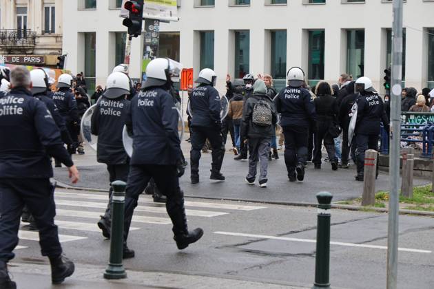 Riot police faces protestors at protests in Brussels for purchasing power, healthcare, and education, on Saturday 24 October 2026.  NICOLASxMAETERLINCK 190870695