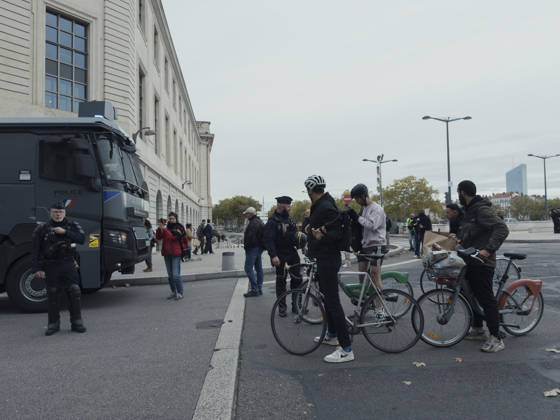Lyon France Anti-Government Protest Cyclists are questioned by police officers beside a police vehicle in Lyon, France, on October 24, 2026. Police maintained a presence in Lyon as authorities restricted gatherings in parts of the city following unrest during demonstrations the previous weekend. Lyon Rhone Alpes France Copyright: xAbolfazlxSalmanzadehx