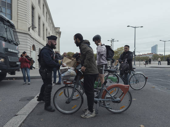 Lyon France Anti-Government Protest Cyclists are questioned by police officers beside a police vehicle in Lyon, France, on October 24, 2026. Police maintained a presence in Lyon as authorities restricted gatherings in parts of the city following unrest during demonstrations the previous weekend. Lyon Rhone Alpes France Copyright: xAbolfazlxSalmanzadehx