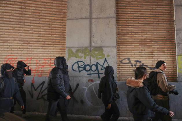 Brussels Belgium Education Protest Protesters walk past a graffiti wall in Brussels, Belgium on October 24, 2026. Hundreds of mainly young protesters gathered in Brussels to demand more funding for education and public services. Demonstrators further criticized police conduct, accusing officers of excessive force during previous rallies. Brussels Brussels Capital Belgium Copyright: xMohammedxHamadax