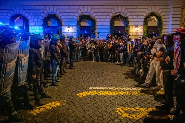 October 24, 2026, Rome, Rm, Italy: Thousands of people take to the streets to join the Get Italy out of the war march. Participants are calling for peace and protesting against the rising cost of living. The police block the way for participants attempting to continue their march outside the agreed-upon route. Rome Italy - ZUMAg256 20261024_znp_g256_025 Copyright: xMarcoxDixGianvitox
