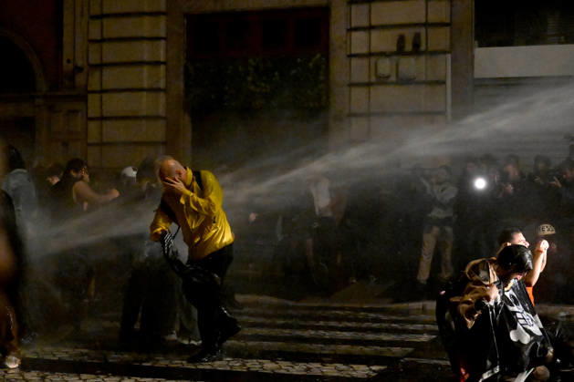 Demonstration against the government in Rome ROME, ITALY - OCTOBER 24: Police officers and water cannon vehicles block a road as anti-government protesters attempt to march toward the prime minister s office, on October 24, 2026 in Rome, Italy. Demonstrators taking part in the protest came face to face with security forces as police prevented them from advancing. Baris Seckin Anadolu Rome Italy. Editorial use only. Please get in touch for any other usage.  Copyright: x2026xAnadoluxBarisxSeckinx