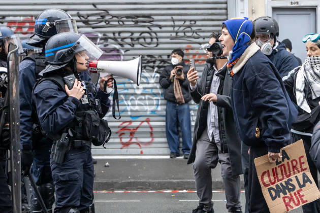 (261024) -- LILLE, Oct. 24, 2026 -- Protesters confront with security personnel in Lille, France, Oct. 24, 2026. Around 410,000 people took part in a new round of protests across France on Saturday, French news channel BFM TV reported, citing the Interior Ministry. (Photo by Xinhua) FRANCE-LILLE-PROTEST SebastienxCourdji 