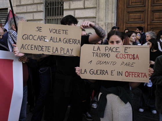 Rome Anti War Protest Demonstrators hold placards reading If you want to play war, turn on the PlayStation and Peace is too expensive, apparently war is on sale during an anti-war protest in Rome, Italy on October 24, 2026. Demonstrators took part in an anti-war march under the slogan Keep Italy Out of the War . Protesters further voiced opposition to Italy s involvement in armed conflicts, military rearmament and government policies. Rome Lazio Italy Copyright: xAndreaxCalandrax