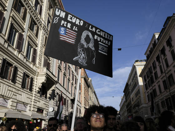 Rome Anti War Protest A demonstrator holds a sign reading One euro for war, zero for the future during an anti-war protest in Rome, Italy on October 24, 2026. Demonstrators took part in an anti-war march under the slogan Keep Italy Out of the War . Protesters further voiced opposition to Italy s involvement in armed conflicts, military rearmament and government policies. Rome Lazio Italy Copyright: xAndreaxCalandrax