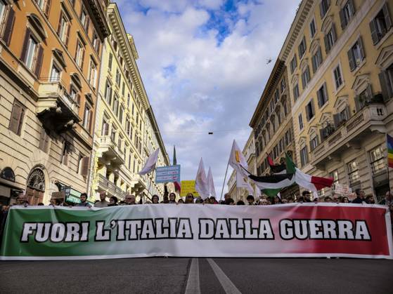 Rome Anti War Protest Demonstrators carry a banner reading Keep Italy Out of the War during an anti-war protest in Rome, Italy on October 24, 2026. Demonstrators took part in an anti-war march under the slogan Keep Italy Out of the War . Protesters further voiced opposition to Italy s involvement in armed conflicts, military rearmament and government policies. Rome Lazio Italy Copyright: xAndreaxCalandrax