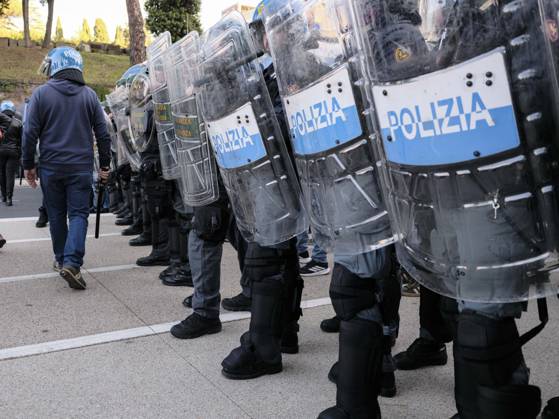 Rome Anti War Protest Police officers stand guard during an anti-war protest in Rome, Italy on October 24, 2026. Demonstrators took part in an anti-war march under the slogan Keep Italy Out of the War . Protesters further voiced opposition to Italy s involvement in armed conflicts, military rearmament and government policies. Rome Lazio Italy Copyright: xAndreaxCalandrax