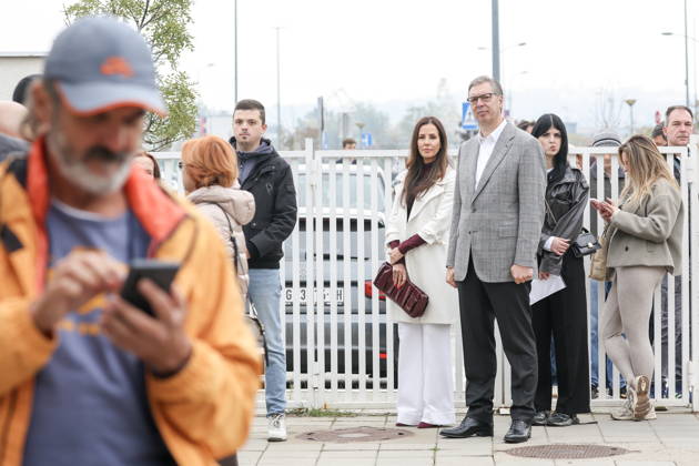 SERBIA, BELGRADE - OCTOBER 25, 2026: Former Serbian president Aleksandar Vucic with wife Tamara (C midground) queues at a polling station during the 2026 Serbian parliamentary election. On 25 October, the Serbs went to the polls to elect members of the country s unicameral parliament, Narodna Skupshtina. Alexander Ryumin TASS  99928489